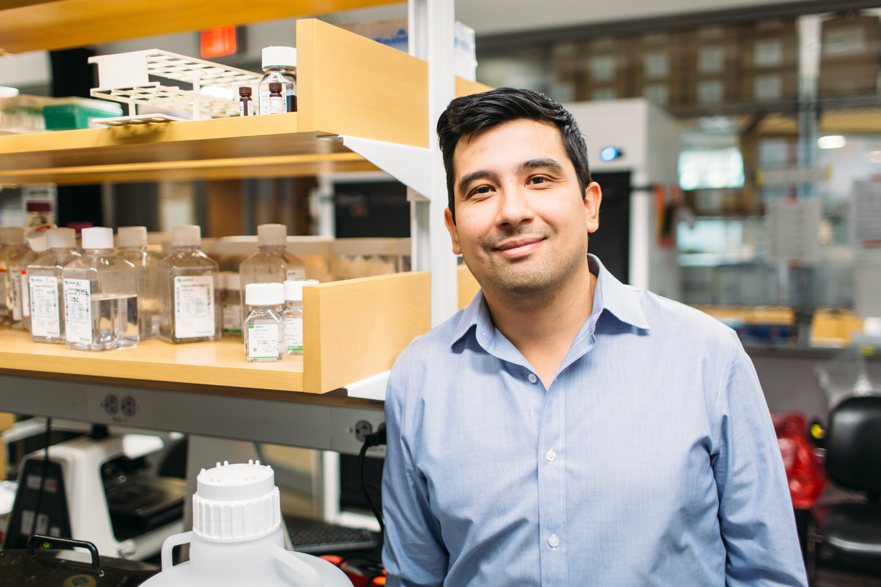 Man in front of a laboratory setting