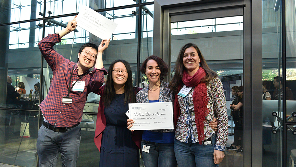 Four scientists show their awards