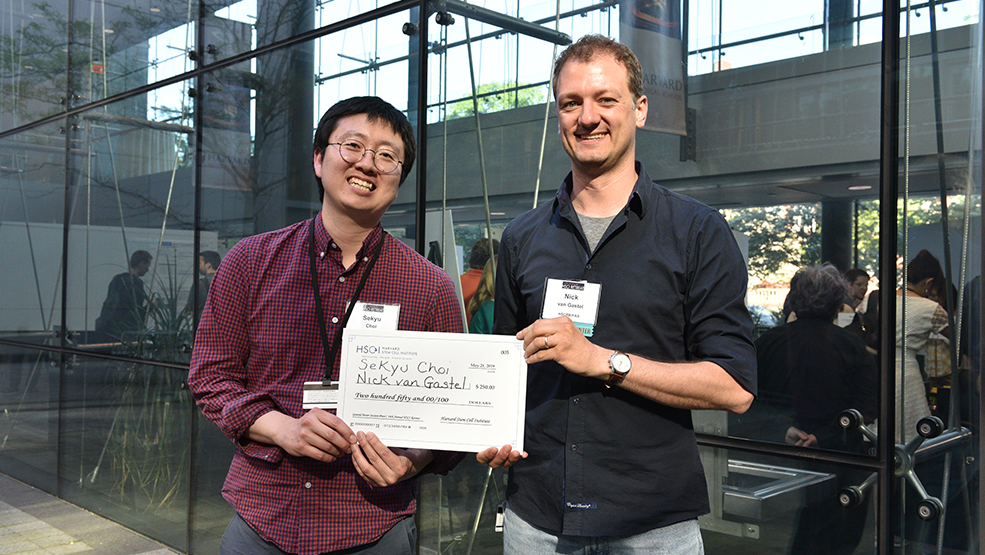Sekyu Choi and Nick van Gastel standing with their awards
