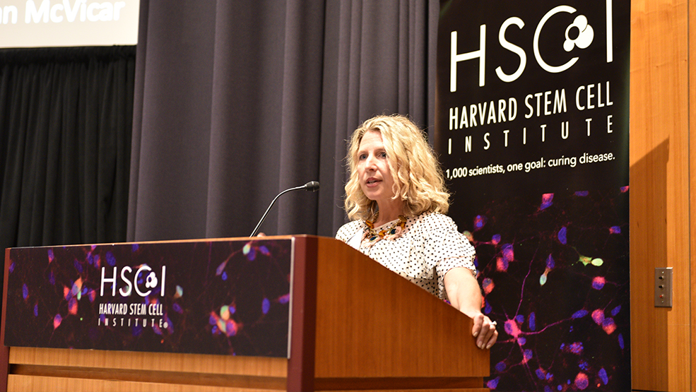 Beth Stevens speaking at an HSCI podium