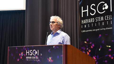 Doug Melton standing at an HSCI podium