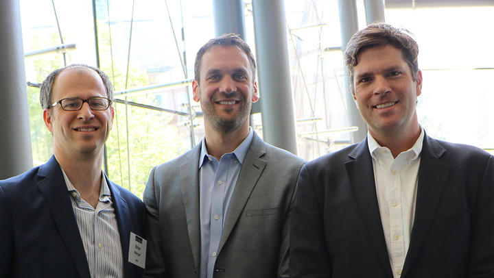 Three HSCI scientists smiling at the camera